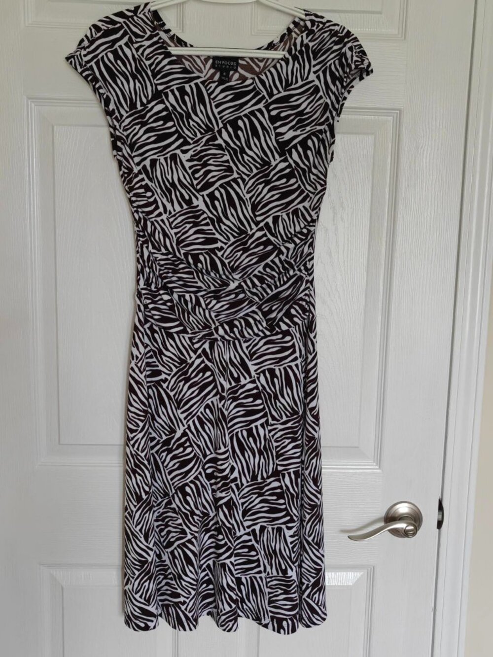 Sleeveless black and white print dress by Enfocus Studio